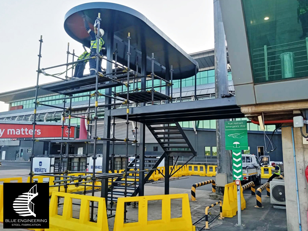 Commercial Steel Staircase Construction at King Shaka Airport. Blue Engineering Undertakes Projects in Gauteng, Johannesburg, Pretoria, KwaZulu Natal, Durban, Western Cape, Cape Town, South Africa