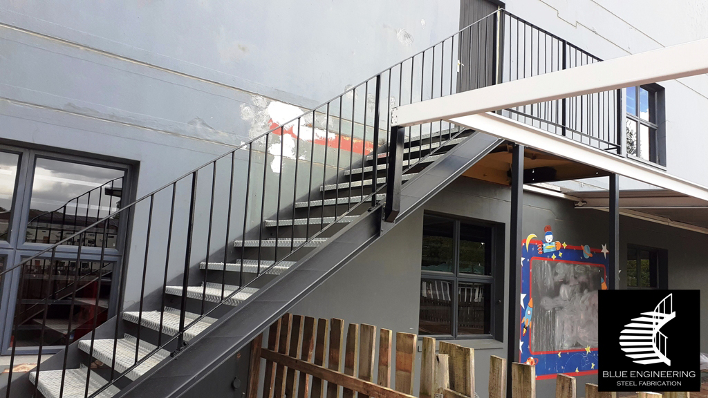 Commercial Steel Staircase with channel  stringer and checker plate treads. Gauteng, Johannesburg, Pretoria, KwaZulu Natal, Durban, Western Cape, Cape Town, South Arica