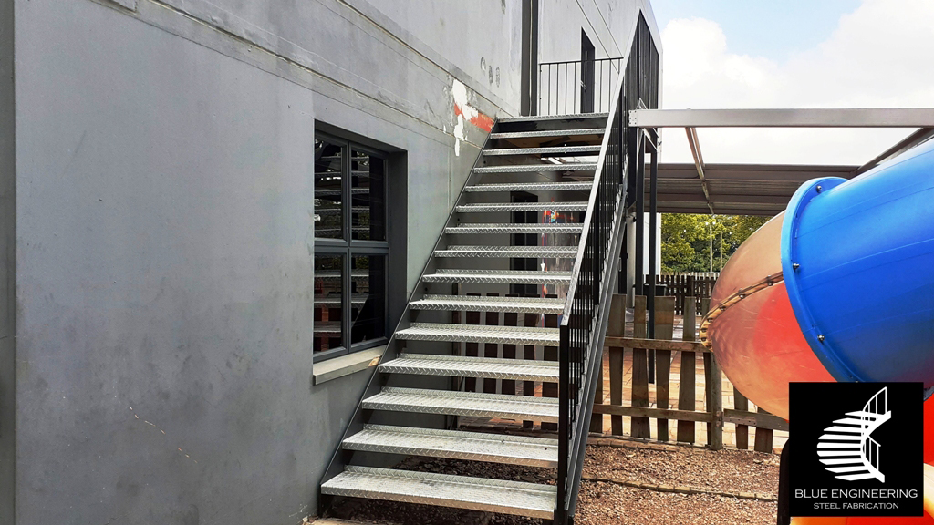 Commercial Steel Staircase with channel  stringer and checker plate treads. Gauteng, Johannesburg, Pretoria, KwaZulu Natal, Durban, Western Cape, Cape Town, South Arica