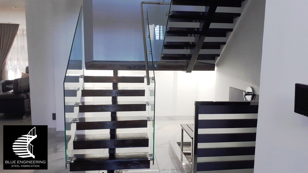 Mono Stringer Staircase with Glass Balustrades, Timber Treads and Stainless Steel Handrails. Gauteng, Johannesburg, Pretoria, Midrand, KwaZulu Natal, Durban, Ballito, South Africa