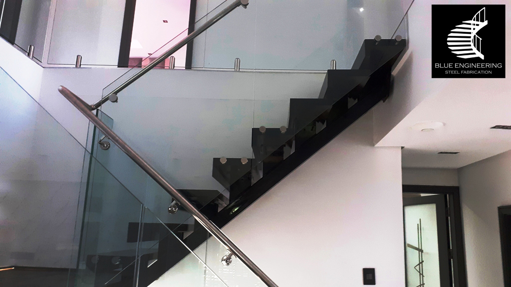 Mono Stringer Staircase with Glass Balustrades, Timber Treads and Stainless Steel Handrails. Gauteng, Johannesburg, Pretoria, Midrand, KwaZulu Natal, Durban, Ballito, South Africa