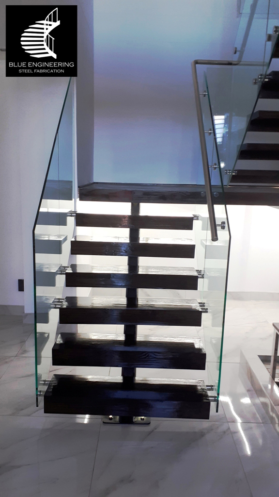 Mono Stringer Staircase with Glass Balustrades, Timber Treads and Stainless Steel Handrails. Gauteng, Johannesburg, Pretoria, Midrand, KwaZulu Natal, Durban, Ballito, South Africa