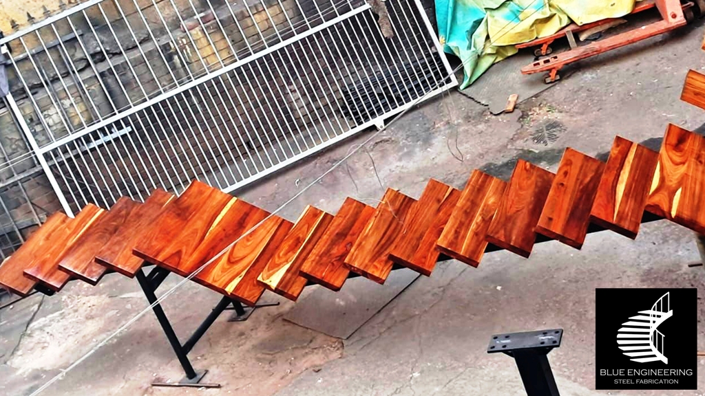 Mono Stringer Staircase with Solid Kiaat Timber TreadsTreads. Blue Engineering supplies to Gauteng, Johannesburg, Pretoria, KwaZulu Natal, Durban, Western Cape, Capetown, South Africa